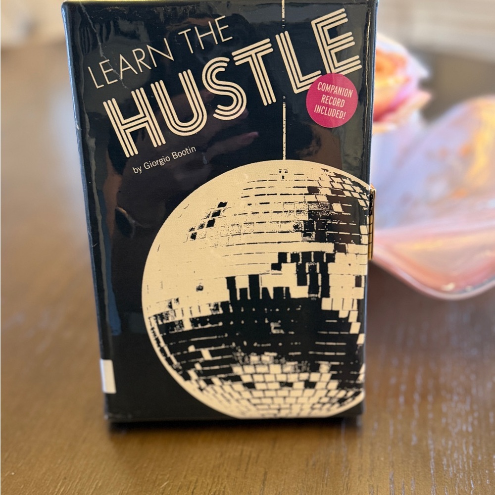 Kate Spade Leran the hustle book clutch NWT